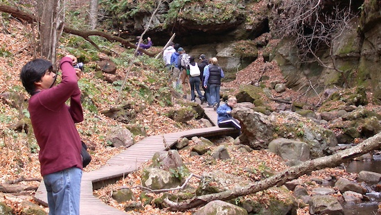 A student photographs geologic formations in Baraboo in 2013